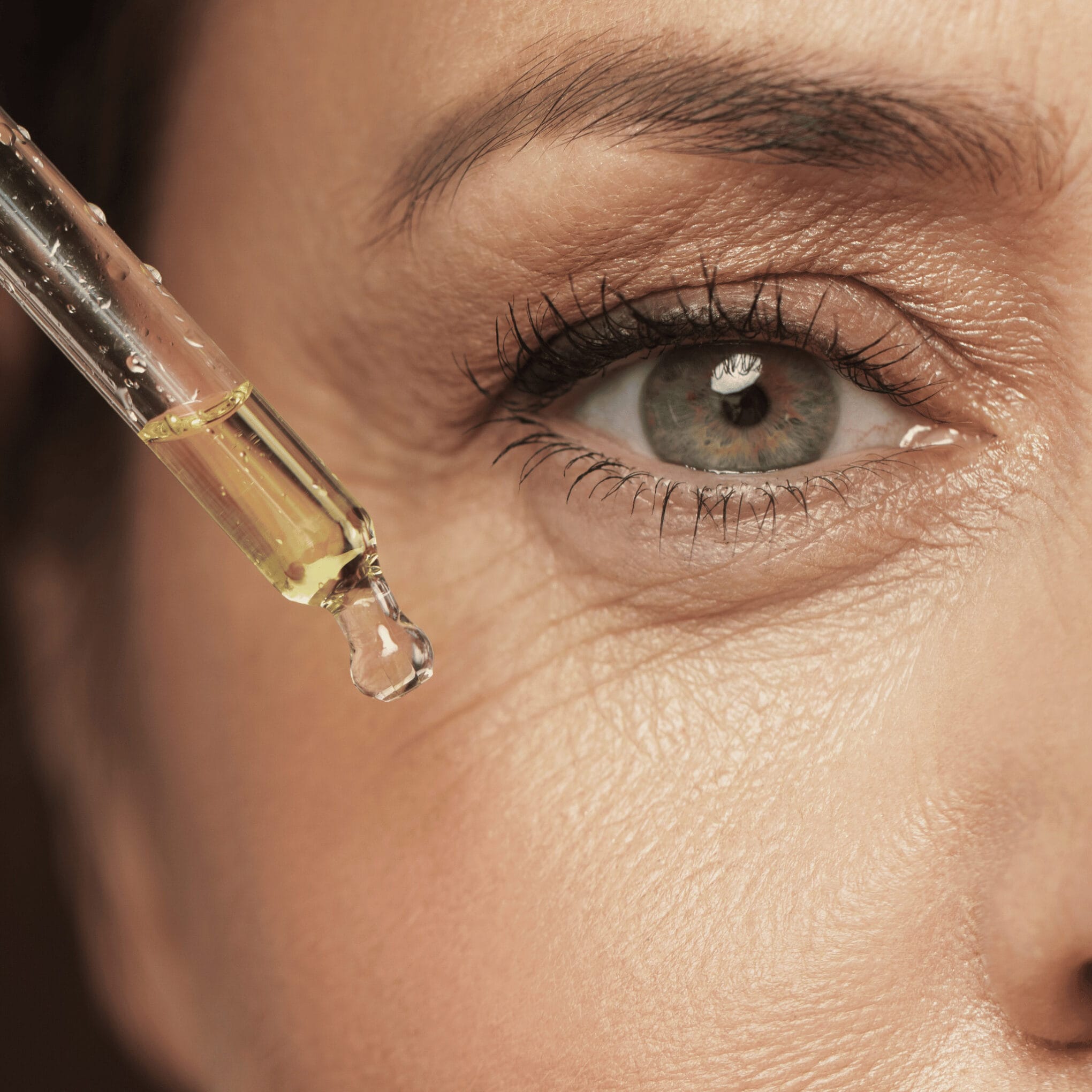 Female Eye and Dropper with hemp oil