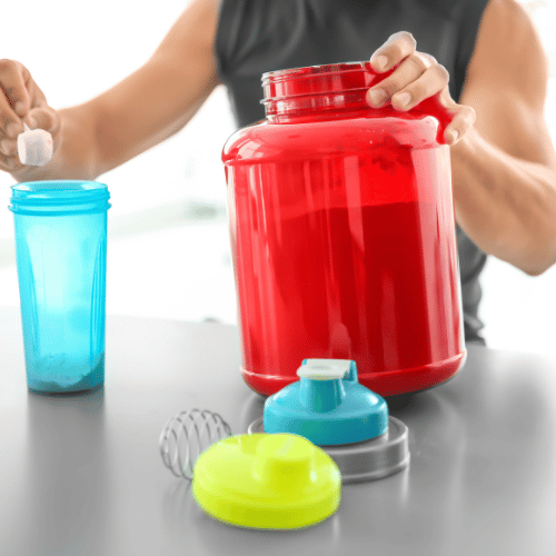 man preparing protein powder